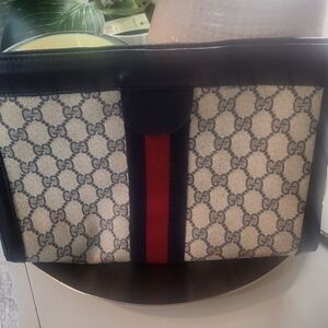 Gucci classic GG monogram canvas clutch